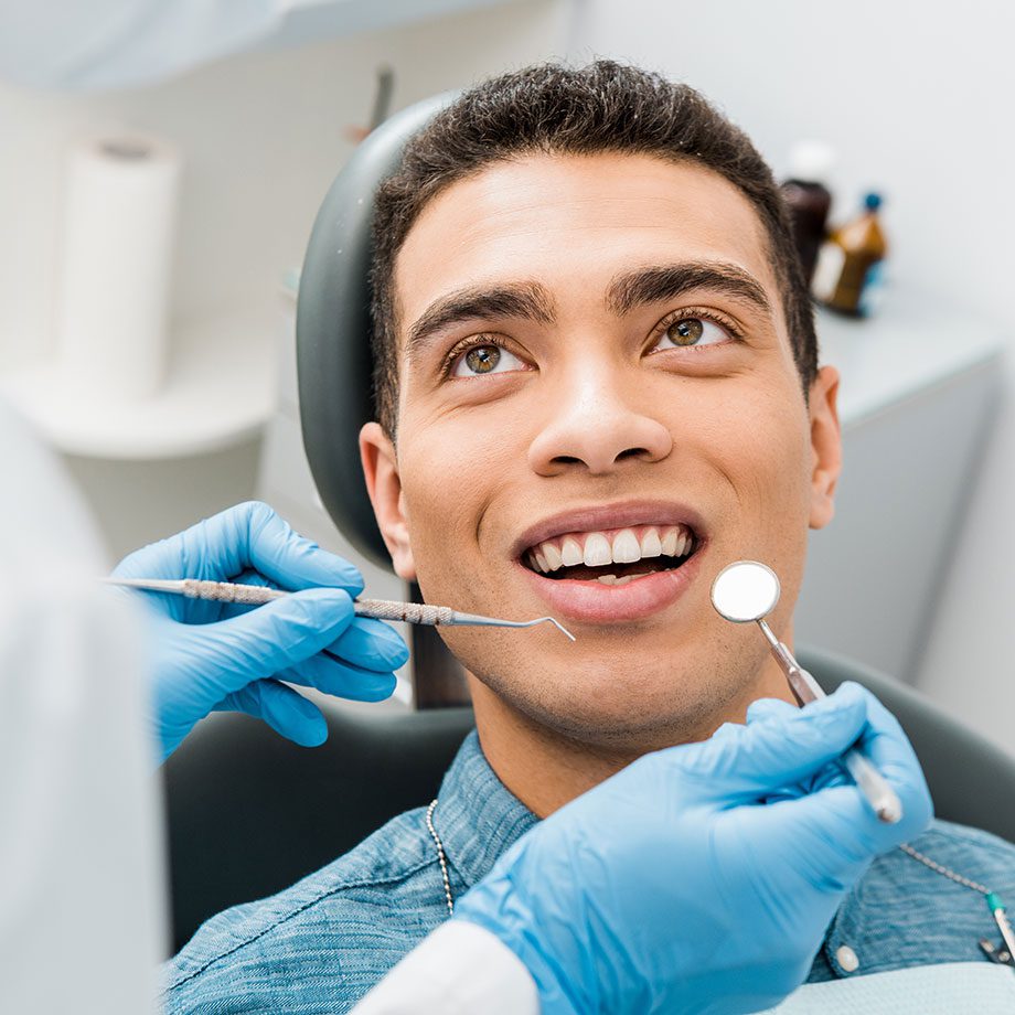 smiling man checkup